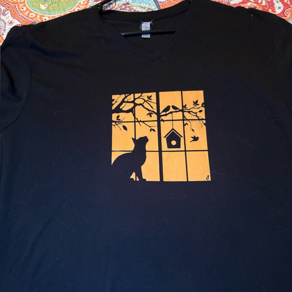 Fall or Halloween Black t-shirt xl, but fits like a large. Cat in a window
